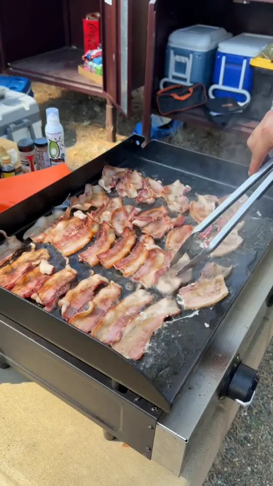 Bacon on a camp griddle, then a pan over to the espresso bar in the hatch